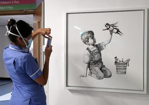 Banksy to auction painting drawn in hospital