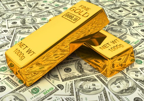 Стоимость золота выросла на фоне ослабления доллара