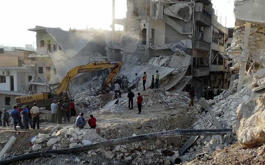 Civil building bombed in Syria, dead and wounded