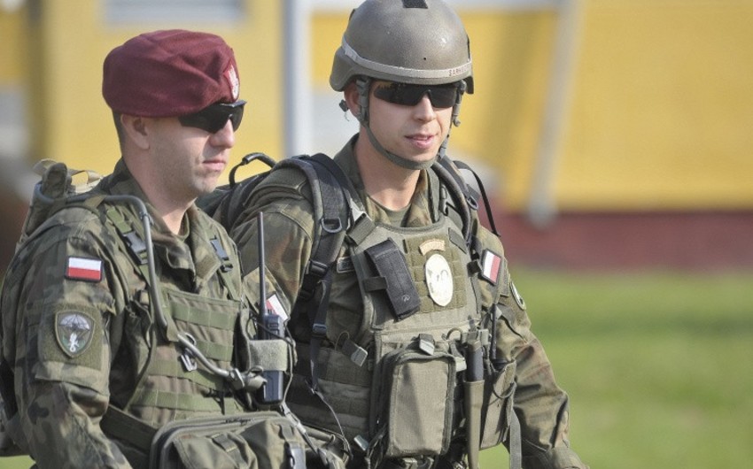 Poland mulling military intelligence brigade close to border with Belarus