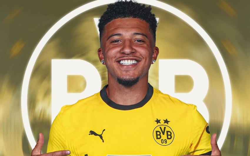 Dortmund sign Jadon Sancho on loan until end of season