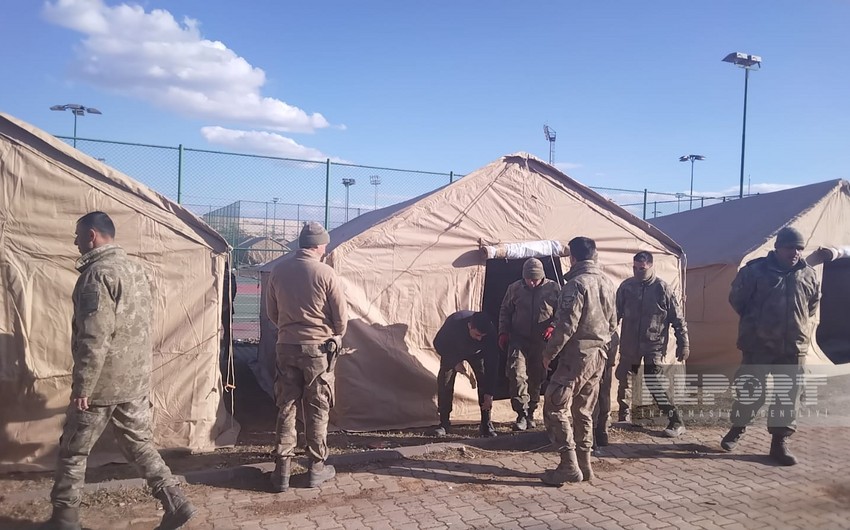 Azerbaijani rescuers setting up another temporary tent camp in Kahramanmaras