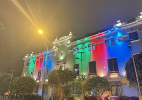 Municipal building in Peru illuminated with colors of Azerbaijani flag