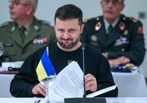 Zelenskyy signs law allowing foreigners to serve as officers in Ukrainian military