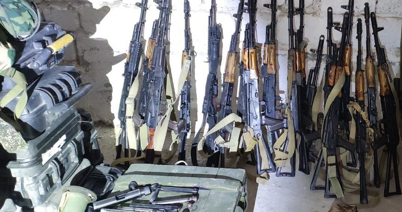 Drone, 29 assault rifles, and 416 grenades found in basement of kindergarten in Khankandi