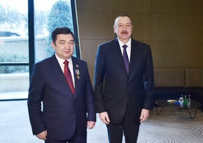 President Ilham Aliyev presents Dostlug Order to President of International Turkic Academy