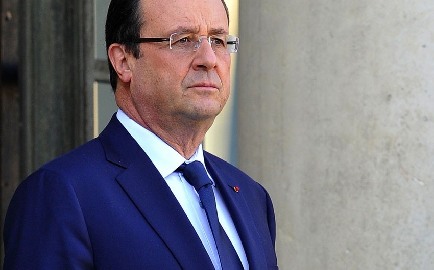 French president says, explosion at IMF's Paris office 'a terrorist act'