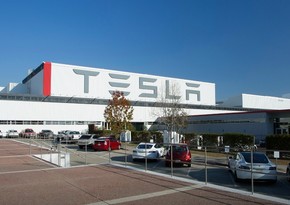 Tesla records first-ever full-year profit