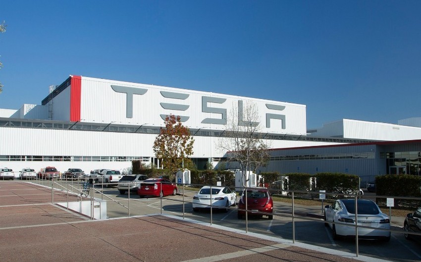 Tesla records first-ever full-year profit