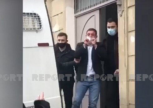 Распространены кадры Аты Абдуллаева в наручниках