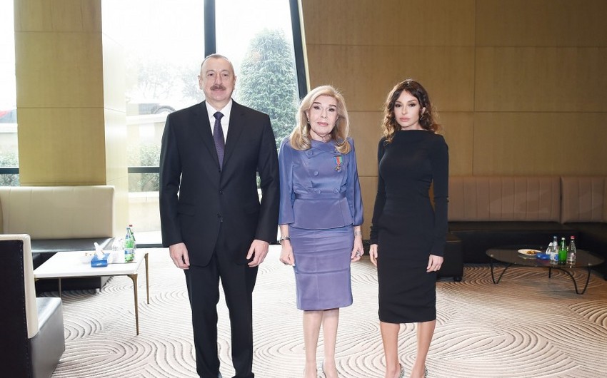 President Ilham Aliyev presents Dostlug Order to President of ELPIDA Association