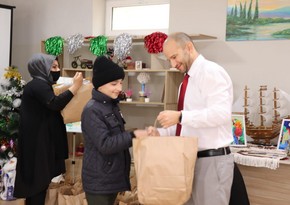 Israeli Embassy donates warm clothes to children of Azerbaijani shelter