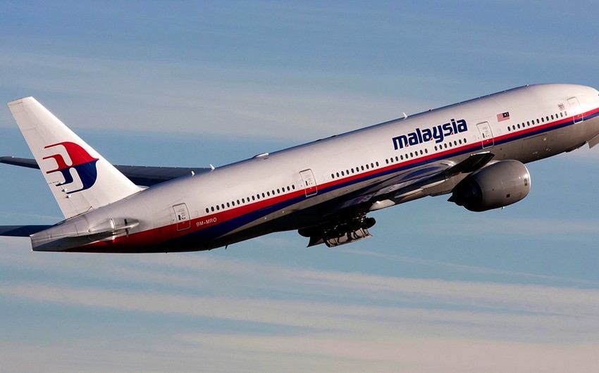 Malaysia confirms wing part washed up on beach is from missing MH370