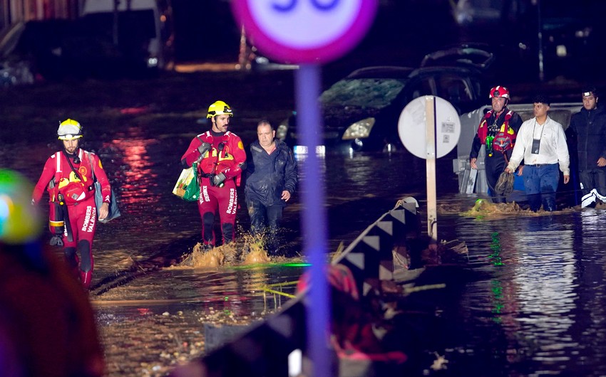 Spain declares three days of mourning as floods kill at least 72 people in Valencia