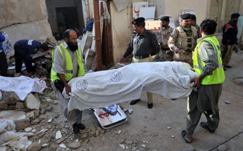 Death toll in suicide bombings that killed Pakistani official rises to 20