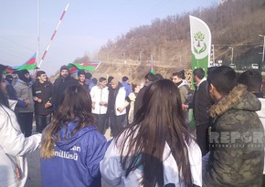 Protesters on Khankandi-Lachin road perform traditional Azerbaijani dances