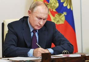 Putin yenidən prezidentliyə namizəd olmasına imkan verən qanunu imzalayıb