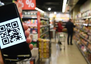 Желтые жилеты в Безансоне заменили портрет Макрона QR-кодом