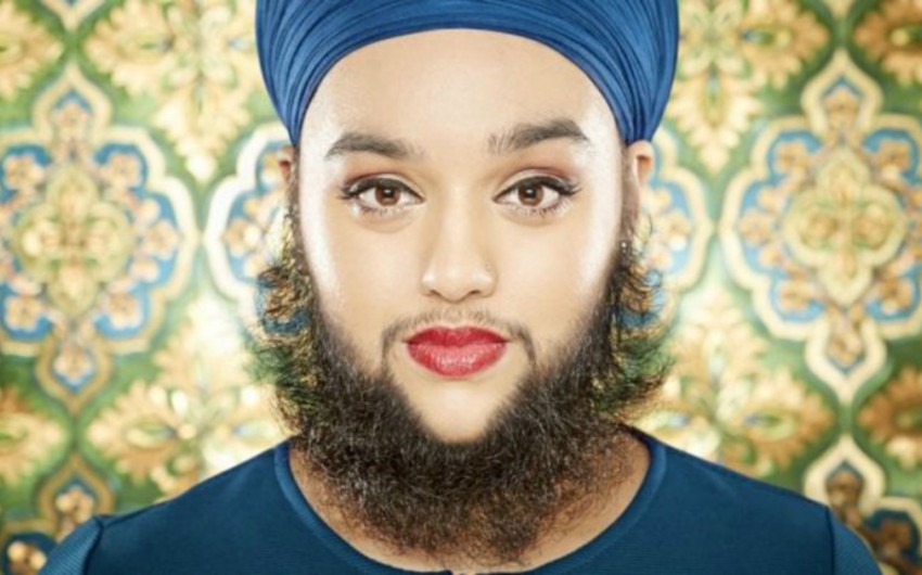Female model enters Guinness records book for 15-cm-long beard