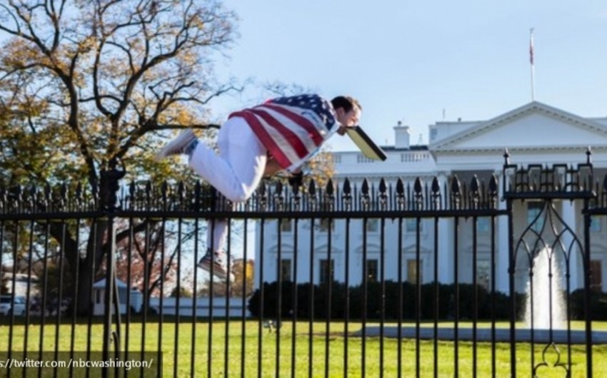 Мужчина с флагом США попытался перелезть через ограду Белого дома