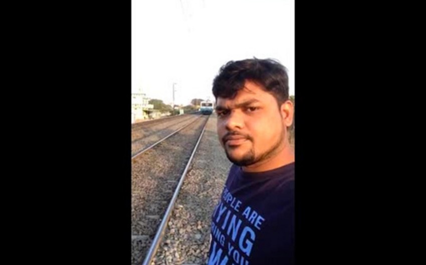 A blogger taking selfie hit by train - VIDEO