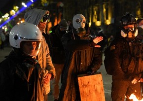 Georgian parliament bans masks at rallies