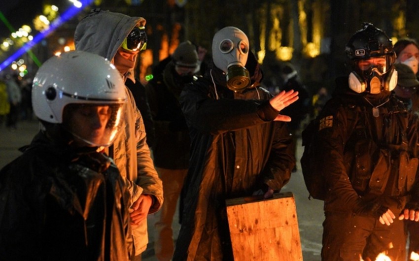 Georgian parliament bans masks at rallies