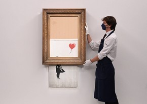 Banksy’s shredding artwork auctioned for $25.4M