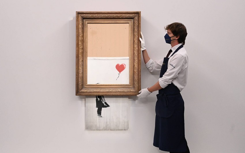 Banksy’s shredding artwork auctioned for $25.4M