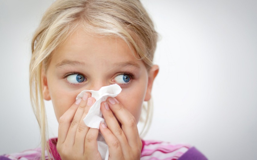 What causes allergies in children?