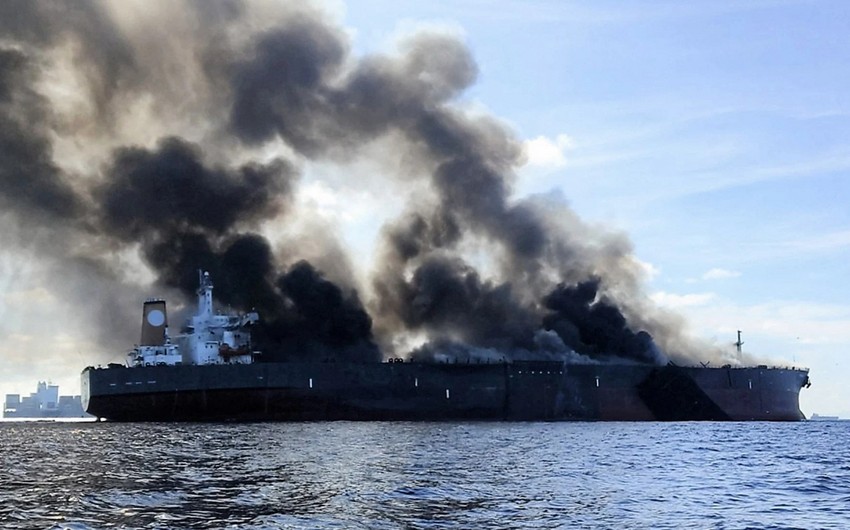 Oil tankers on fire off Singapore