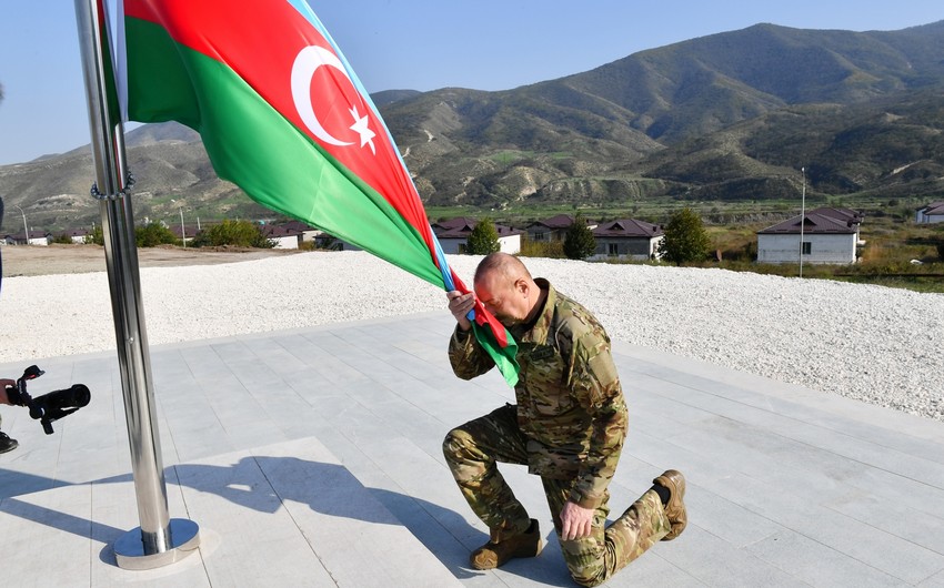 President Ilham Aliyev raises national flag of Azerbaijan in Khojaly city and Asgaran settlement