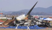 South Korean acting president extends condolences to plane crash victims at memorial altar