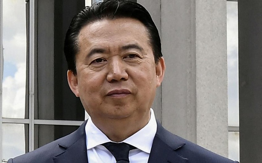 Former Interpol head sentenced to 13.5 years in prison in China