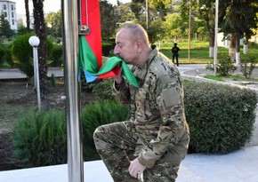 President Ilham Aliyev raises national flag of Azerbaijan in Khojavand city