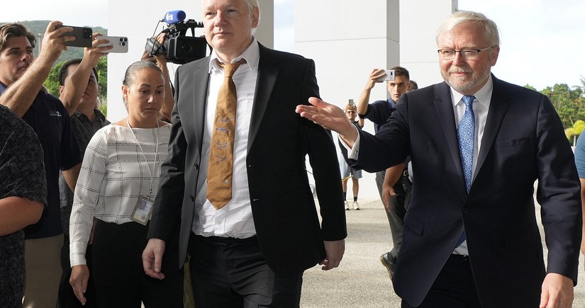 Assange walks free after being sentenced to time already served