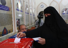 Iran extends presidential voting by two hours