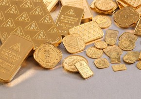 Стоимость золота незначительно снизилась в ожидании статистики из США