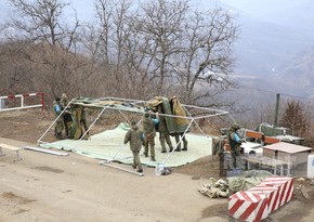 Russian peacekeepers dismantle their tents set up in protest area, take away containers - VIDEO