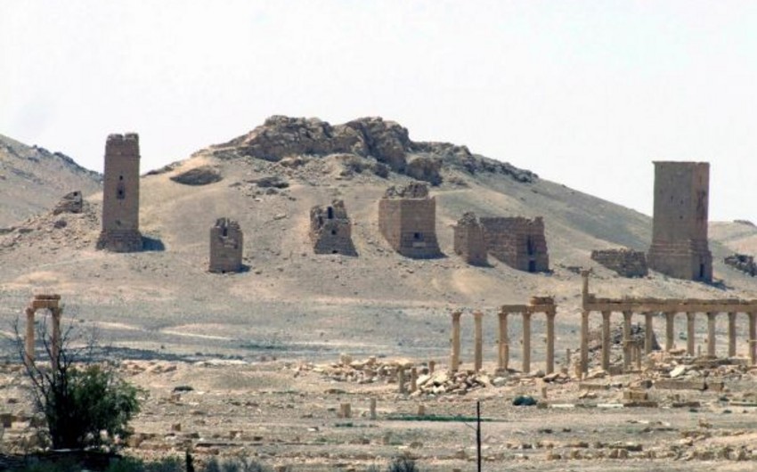 ISIS strap three men to ancient Palmyra columns before blowing them up