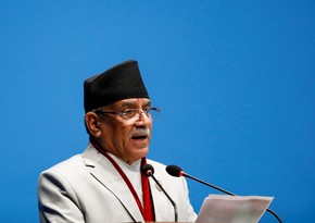Nepalese prime minister calls on developed countries to share resources to combat climate change