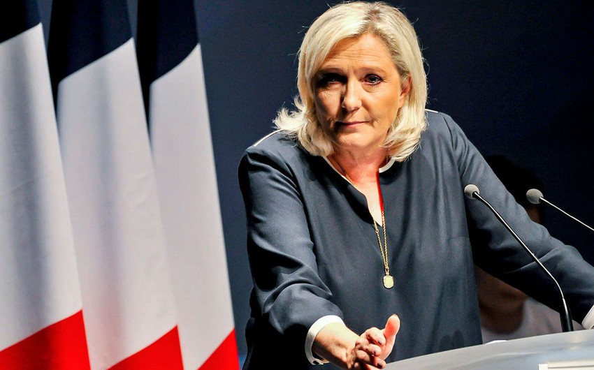 Le Pen's party poised for victory in French parliamentary elections, poll suggests
