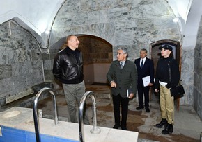President Ilham Aliyev, First Lady Mehriban Aliyeva view restoration work in administrative building and Shirin Su Bath in Shusha