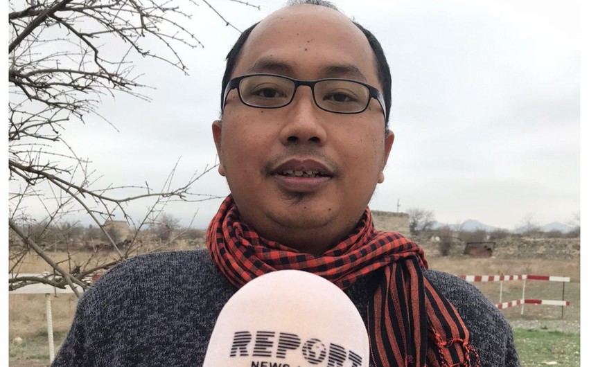 Indonesian journalist struck by sight of destroyed Aghdam