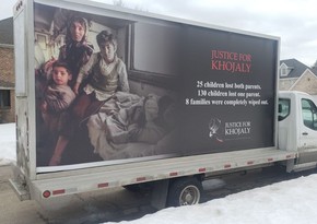 Car with digital posters on Khojaly realities to move in US streets