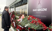 Ukrainian envoy at Baku airport honors victims of plane crash 