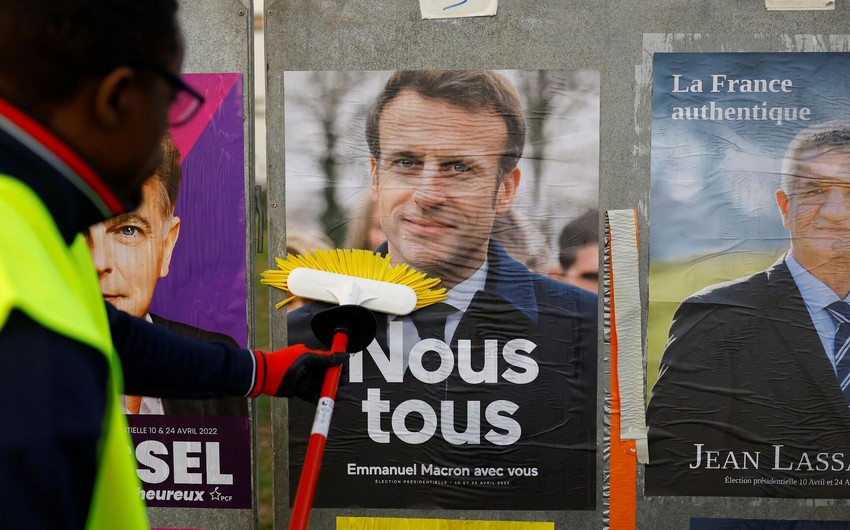 Poll: Macron closing gap on Le Pen ahead of elections