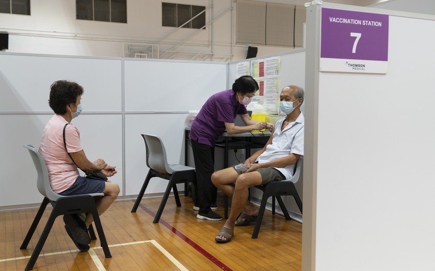 Singapore vaccinates 80% of population against COVID-19