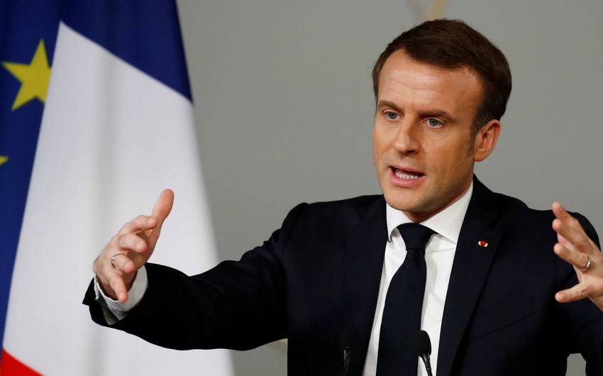 Macron advises French to work harder