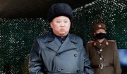 North Korea's Kim blasts South media over flood damage 'rumours'